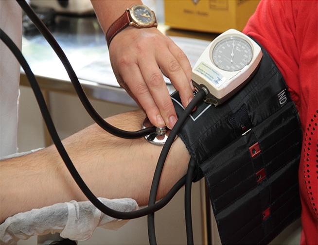 Patient undergoing hypertension evaluation and care at Denton Family Practice Clinic.