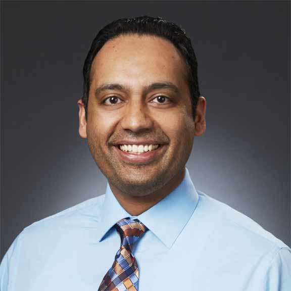 Portrait of Dr. Harveer Parmar, a dedicated and experienced Family physician.
