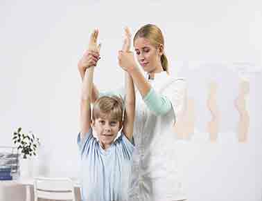 A young athlete undergoing a sports physical examination at Denton Family Practice Clinic.